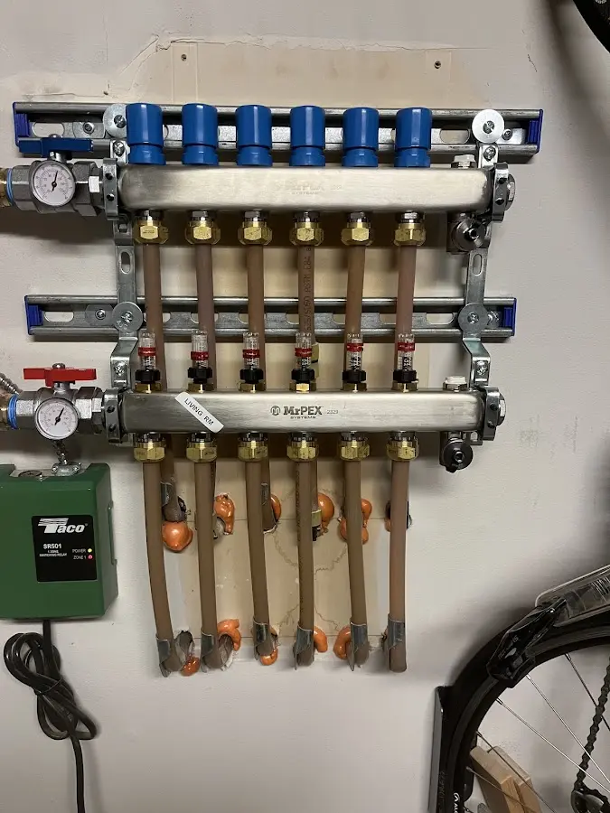 Plumber performing Water Heater Repair at a residential property in Biscayne Park